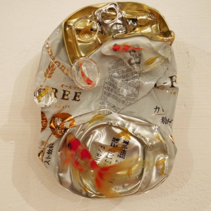 Riusuke Fukahori's '3D' goldfish suspended in droplets on a discarded beer can. Giving an unwanted object a new lease of life.